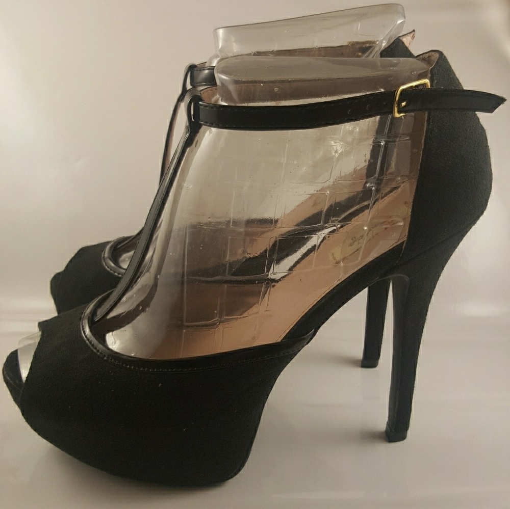 Black open-toed ankle strapped heels